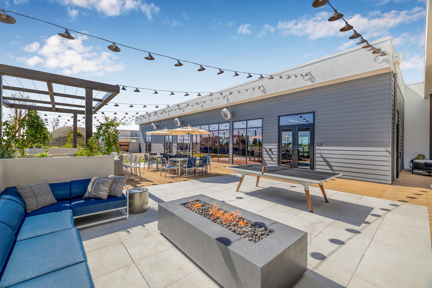 Cutting-edge amenities at your fingertips a rooftop fire pit