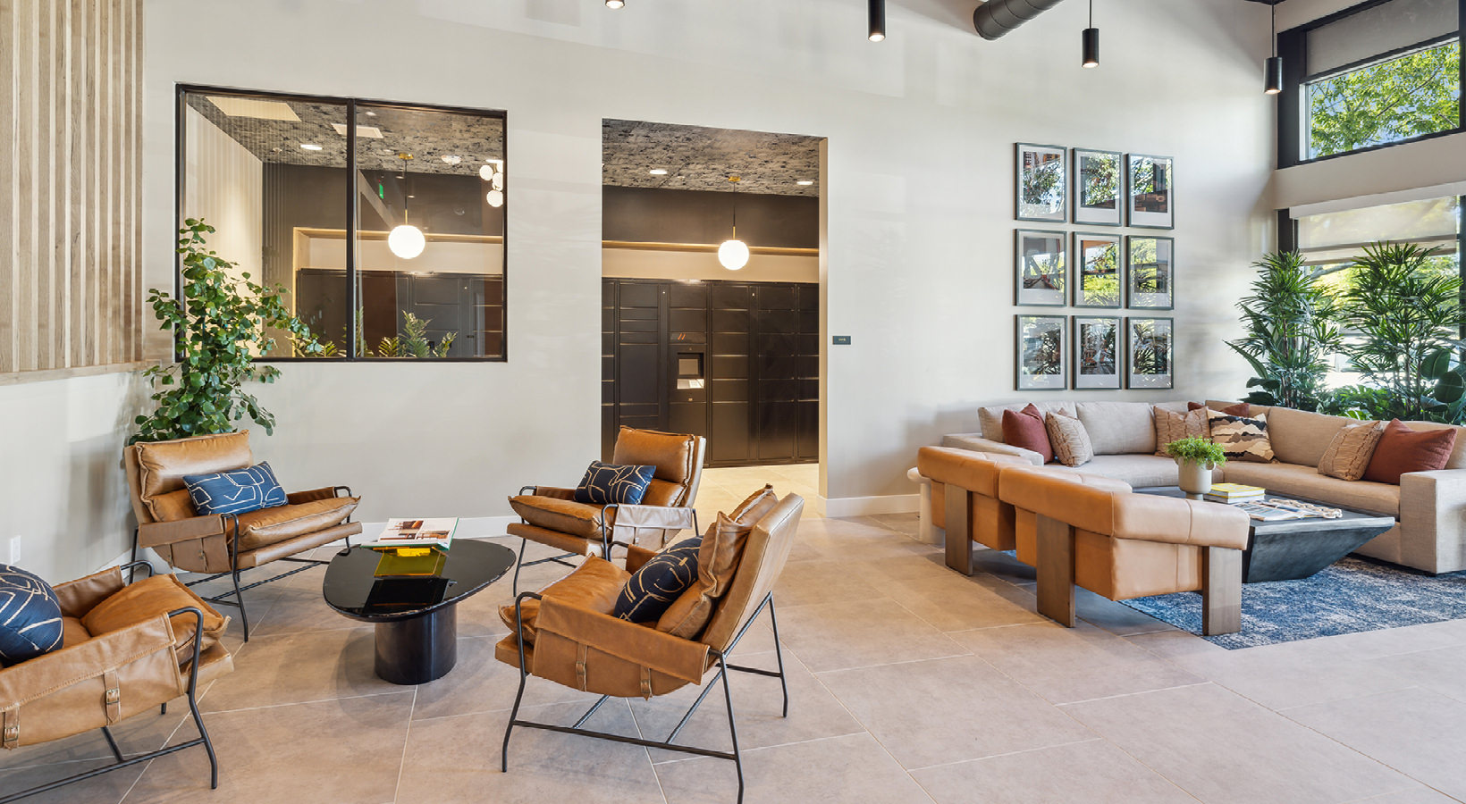 Spacious outdoor lounge area with camel-colored chairs