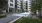 a courtyard with trees and buildings