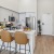 a kitchen with white cabinets