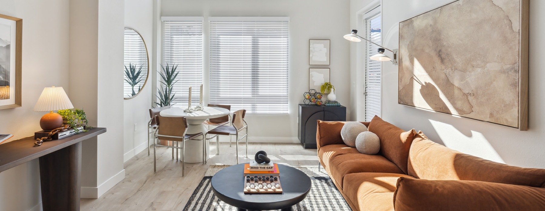 a living room with a couch and a table