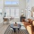 a living room with a couch and a table