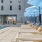 Resort-style swimming pool with lounge seating