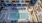 Resort-style swimming pool with lounge seating