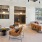 Spacious outdoor lounge area with camel-colored chairs